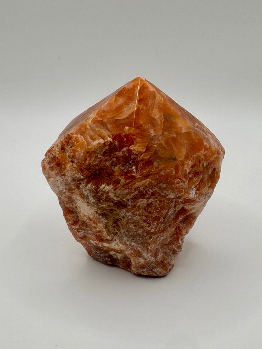 Punta di Calcite Arancione con Base Grezza