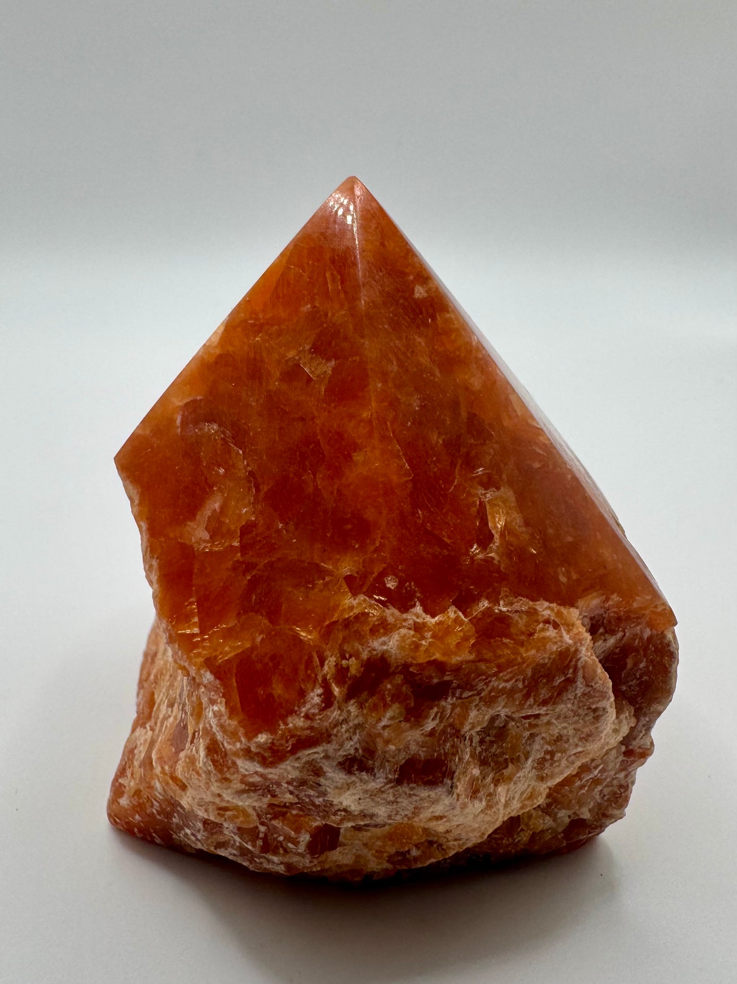 Punta di Calcite Arancione con Base Grezza