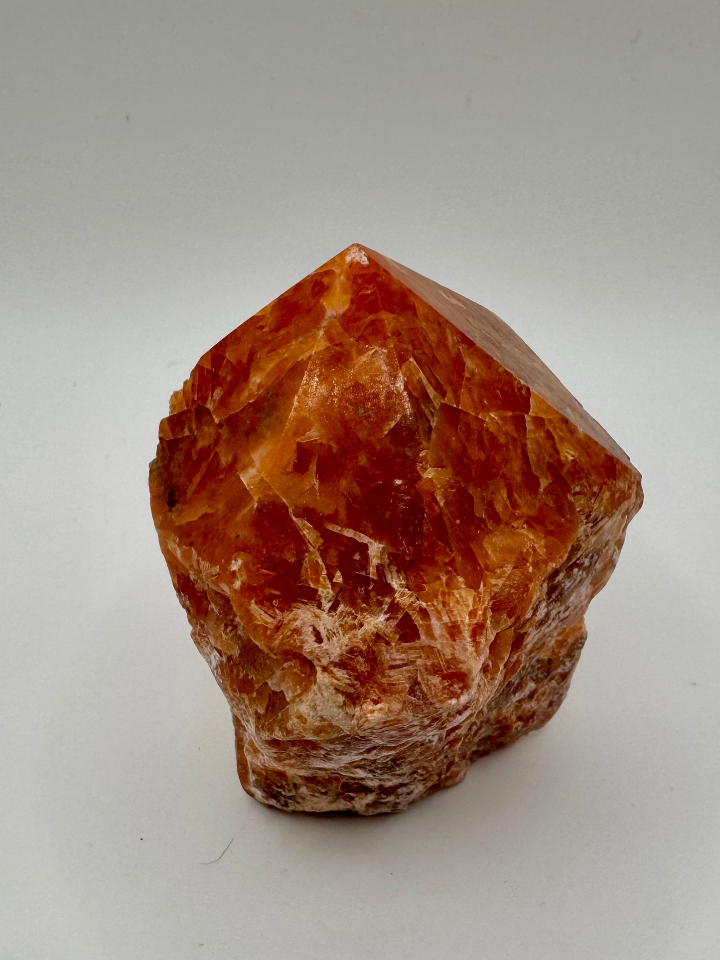 Punta di Calcite Arancione con Base Grezza